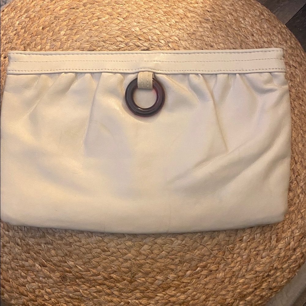 Chic Cream Clutch with Ring Accent